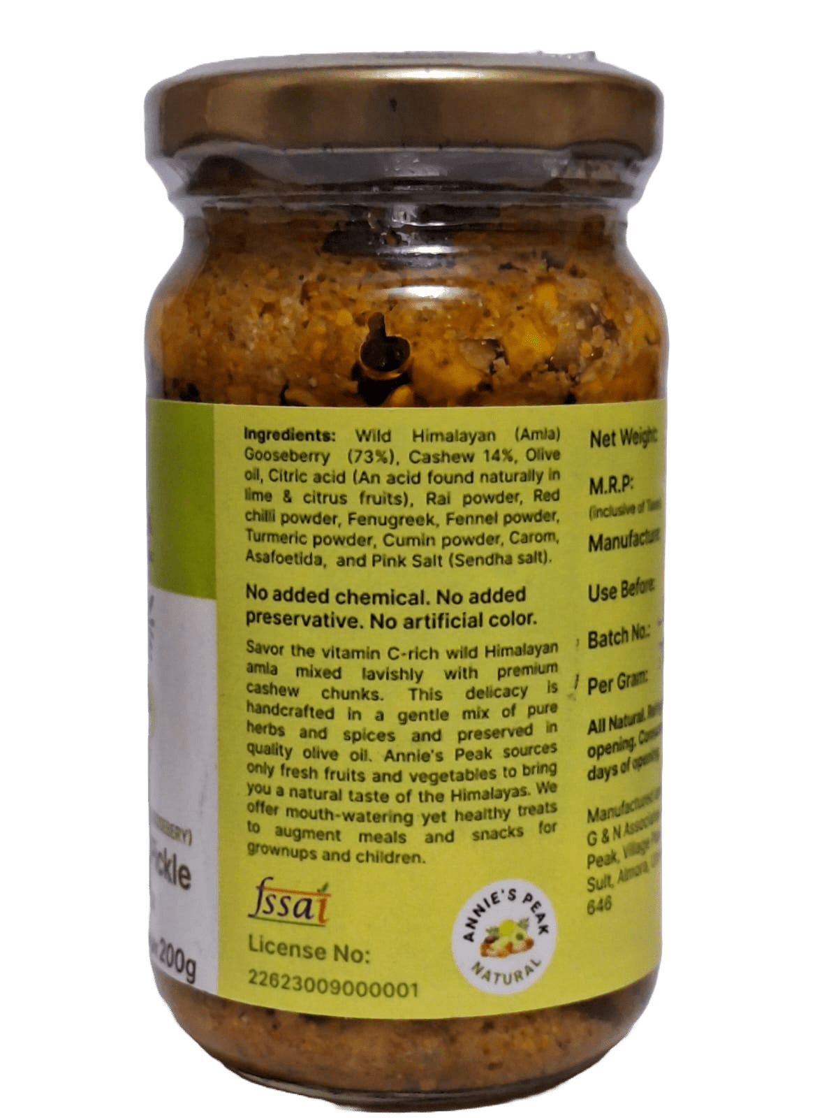 A jar of Cashew Amla Pickle with olive oil, clearly labeled with the ingredient information.
