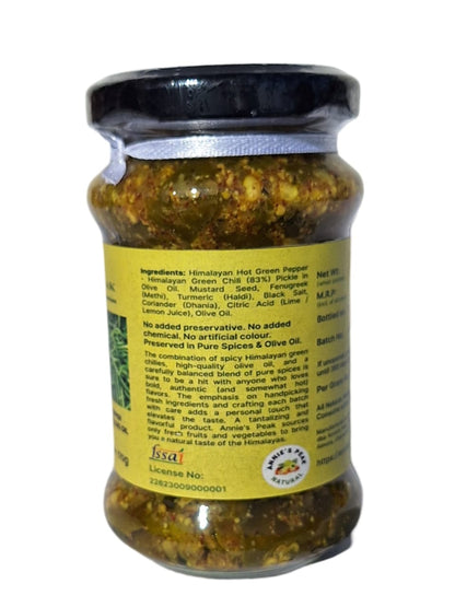 Ingredients label jar of Annie's Peak Himalayan Green Chili preserved in extra virgin olive oil on a clear background
