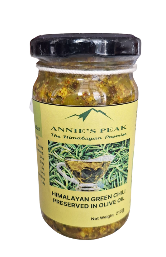 Jar of Annie's Peak Himalayan Green Chili preserved in extra virgin olive oil on a clear background