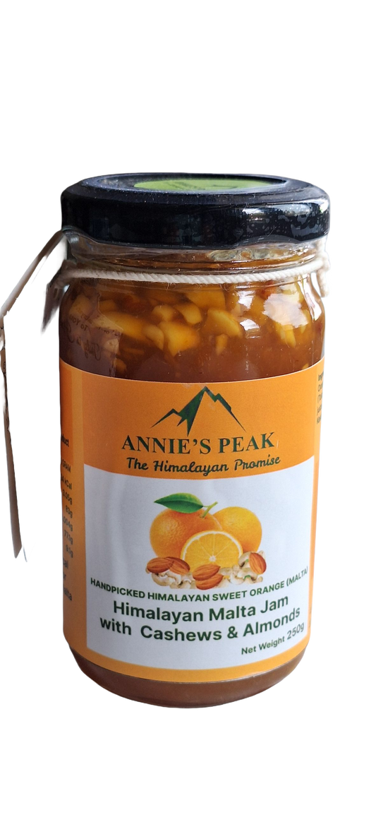 Jar of Annie's Peak Himalayan Malta Marmalade Jam with Cashews & Almonds on a clear background