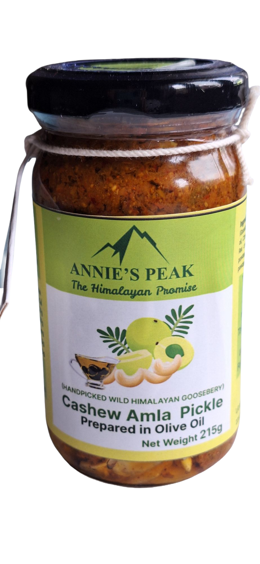 Front label on a Jar of Annie's Peak Cashew Amla Pickle on a clear background